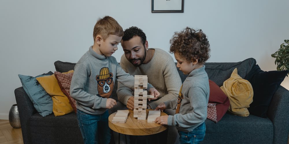 man with two children