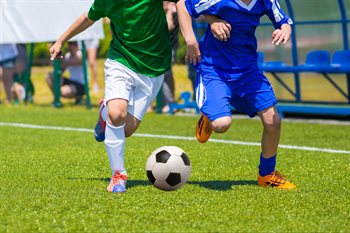 Children-Playing-Football